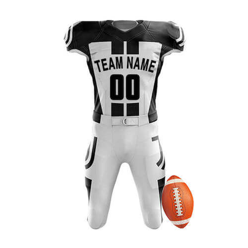 A white and black football uniform with black stripes, placed beside a American football